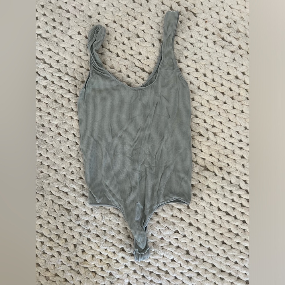 Skims light blue bodysuit